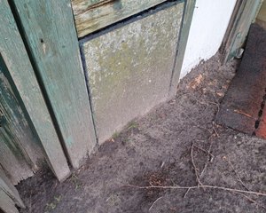 Asbest plaatje in een deur